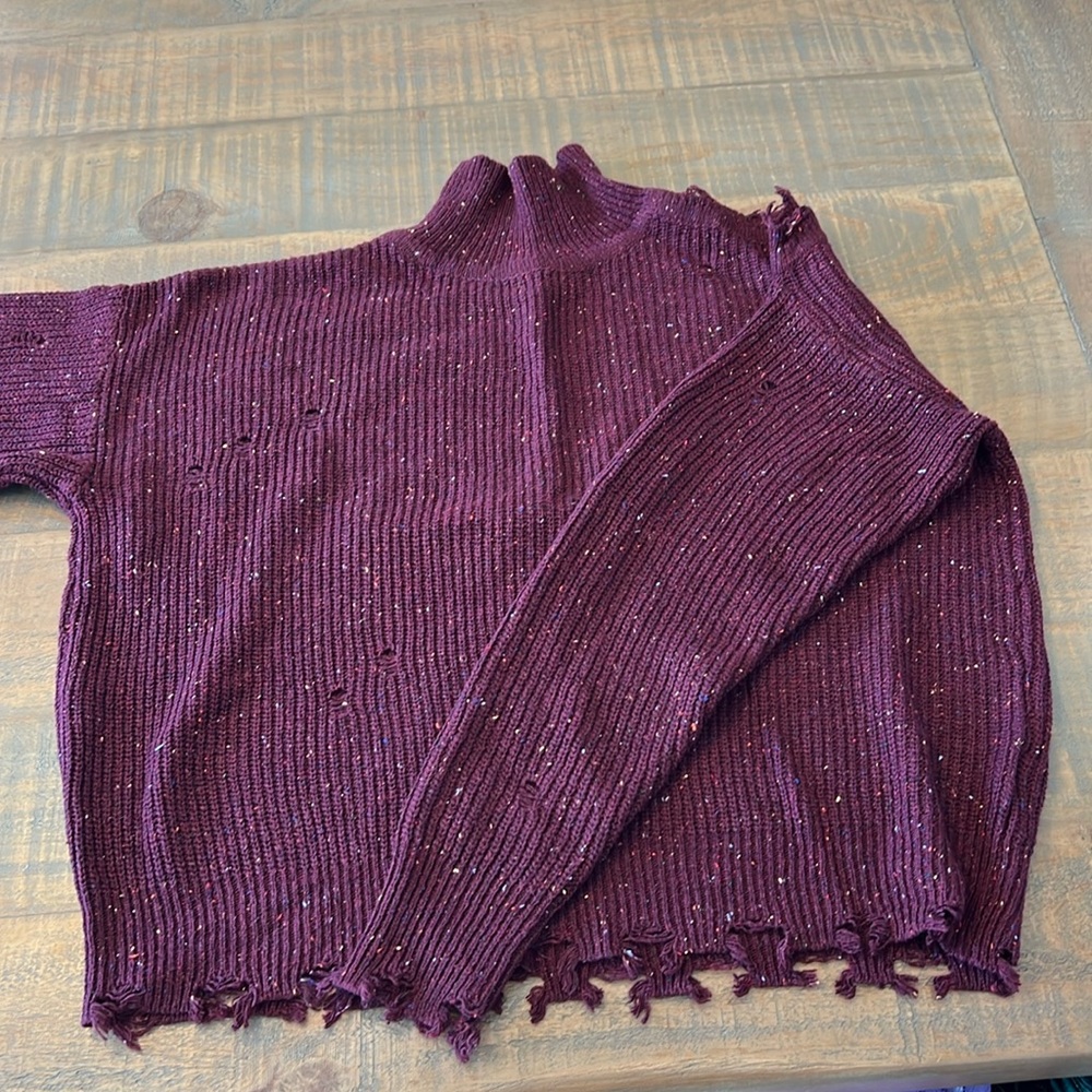 Women’s distressed sweater